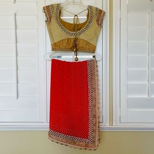 Beautiful all over pearls orange pure georgette saree with custom blouse